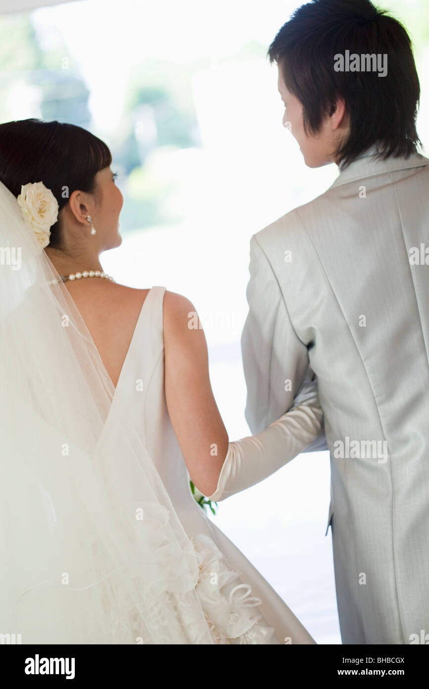 Rear view smiling bride hi-res stock photography and images - Alamy