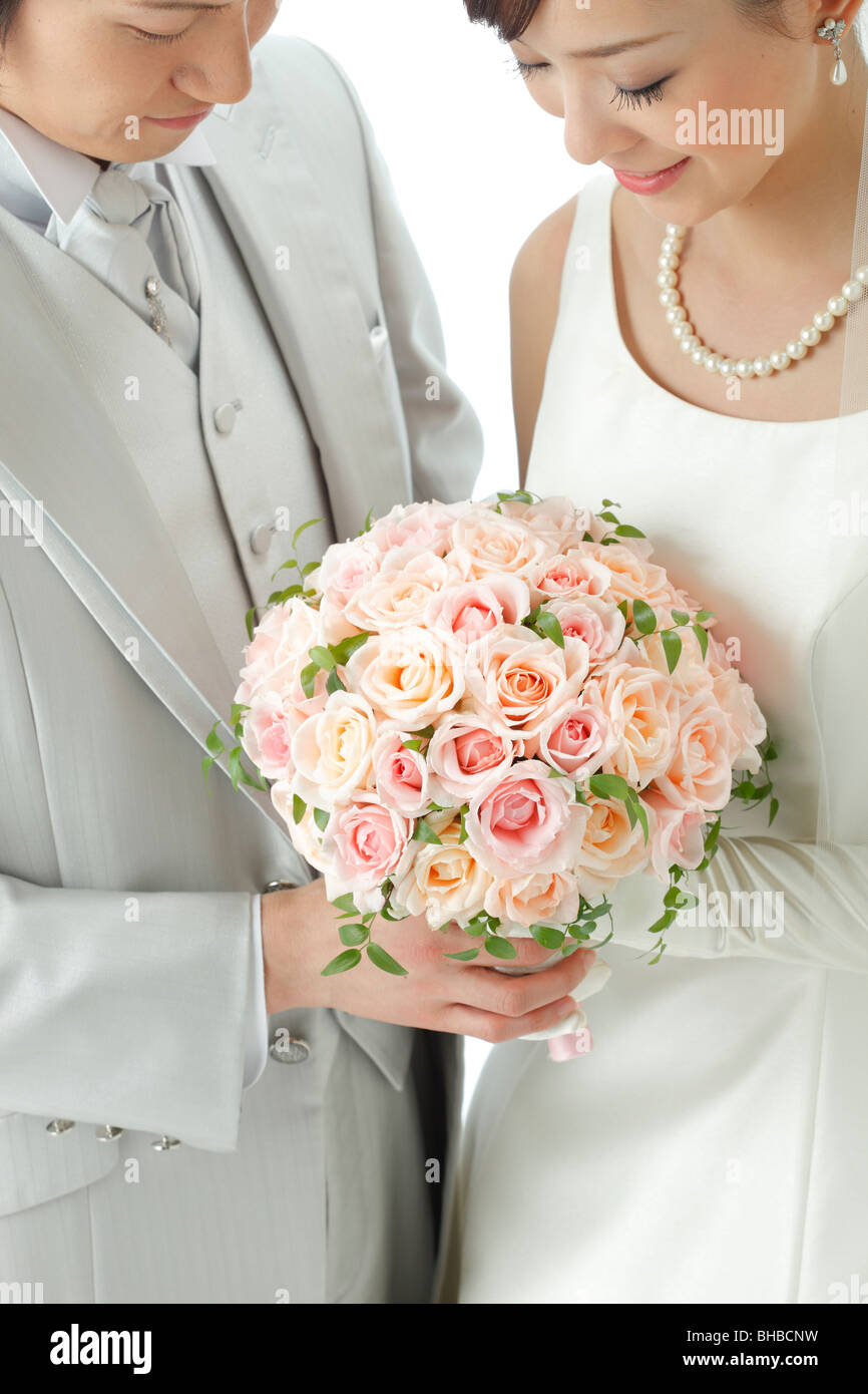 Japanese couple holding bouquet hi-res stock photography and images - Alamy