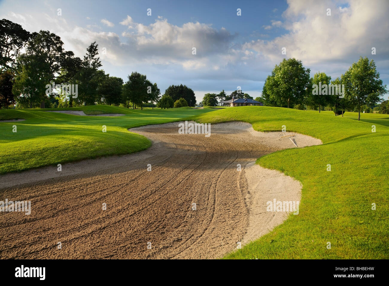 Sand trap on golf course Stock Photo - Alamy