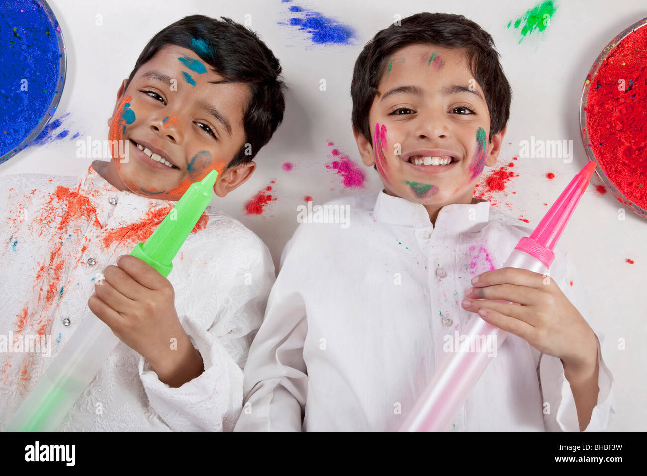 Boys posing with pitchkaris Stock Photo