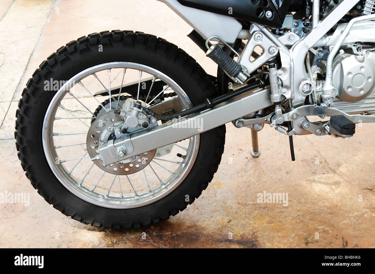 A side view of an off-road motorcycle swing arm Stock Photo - Alamy