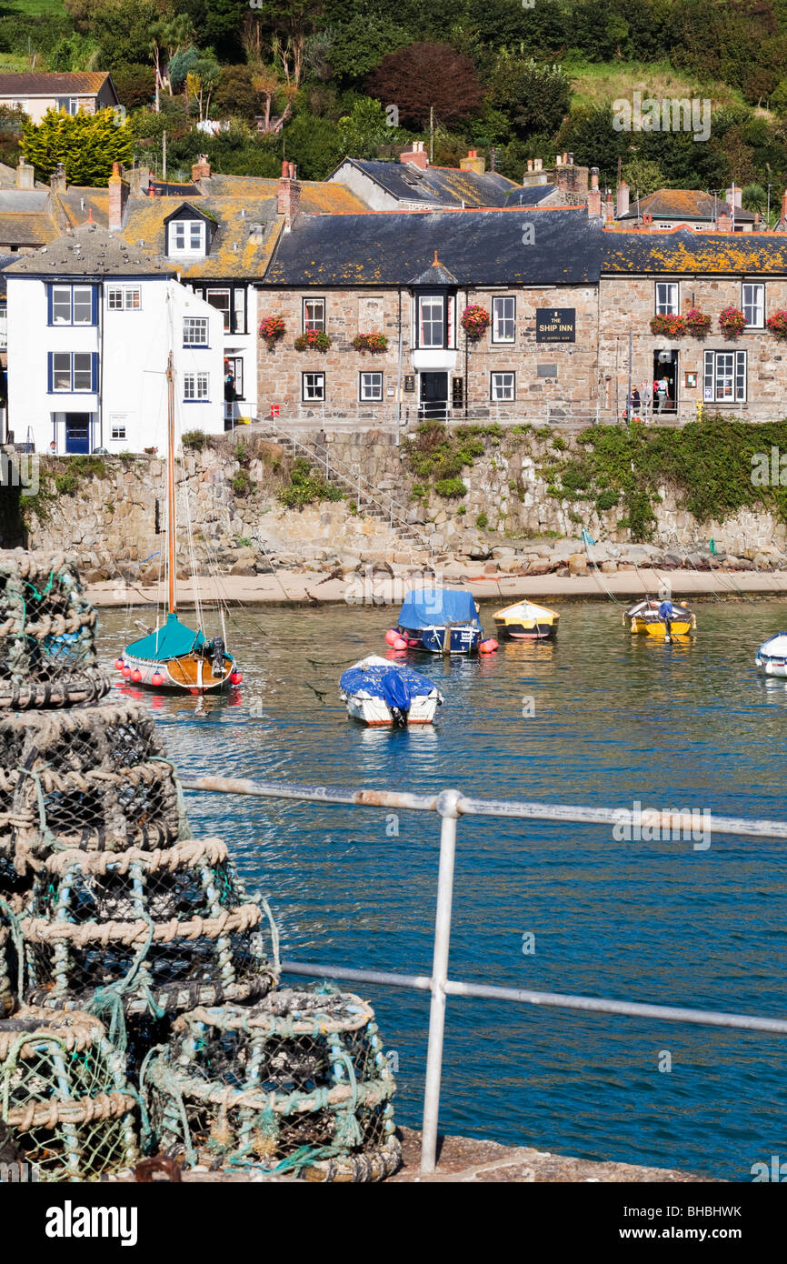 The Ship Inn on the harbourfront in the old fishing village of Mousehole, Cornwall UK Stock Photo
