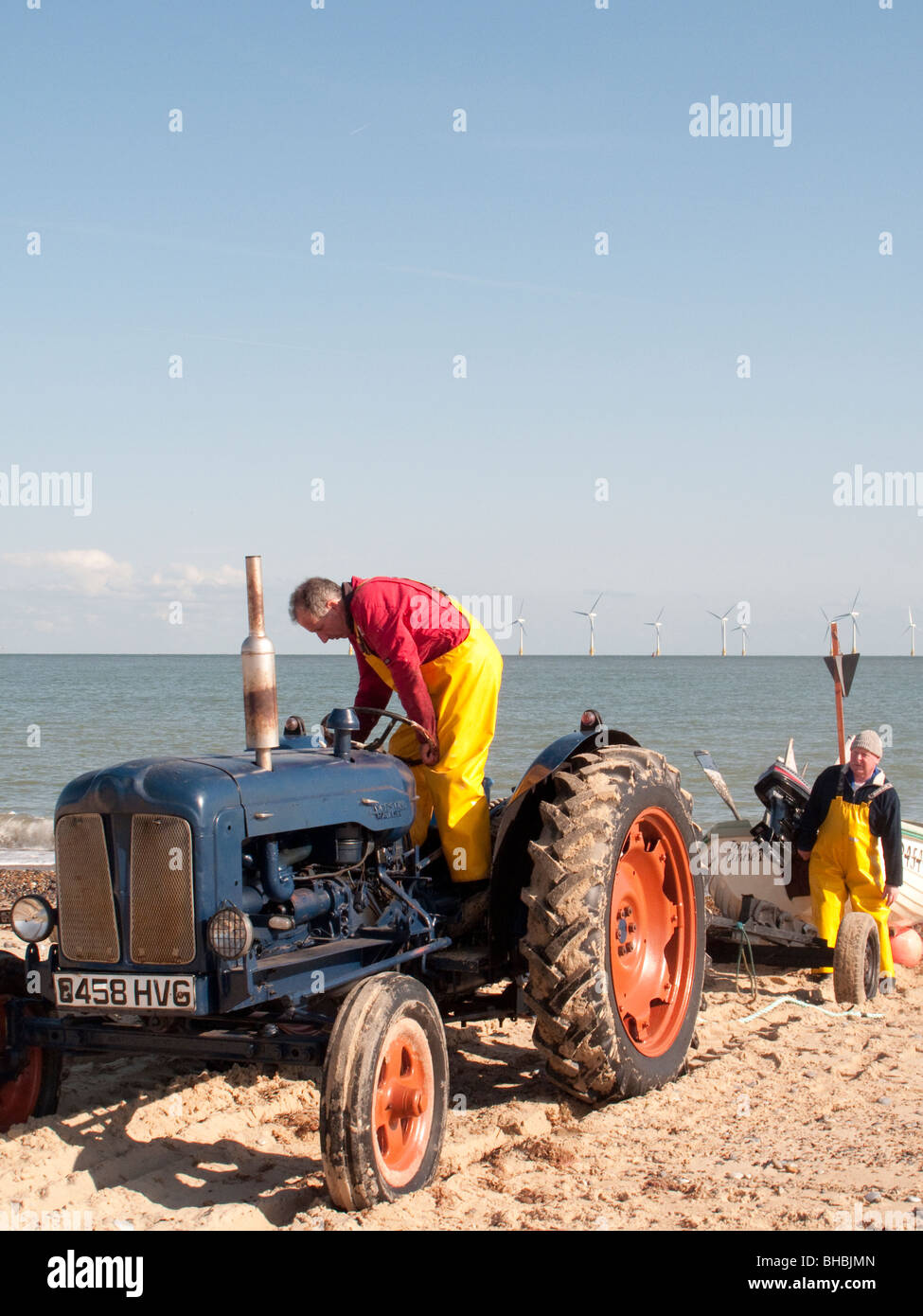 Fishermen coming back to shore near Great Yarmouth Stock Photo Alamy