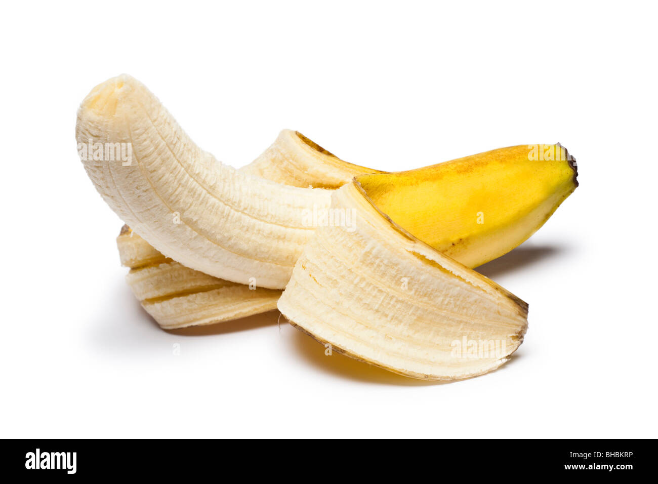Banana half peeled Stock Photo