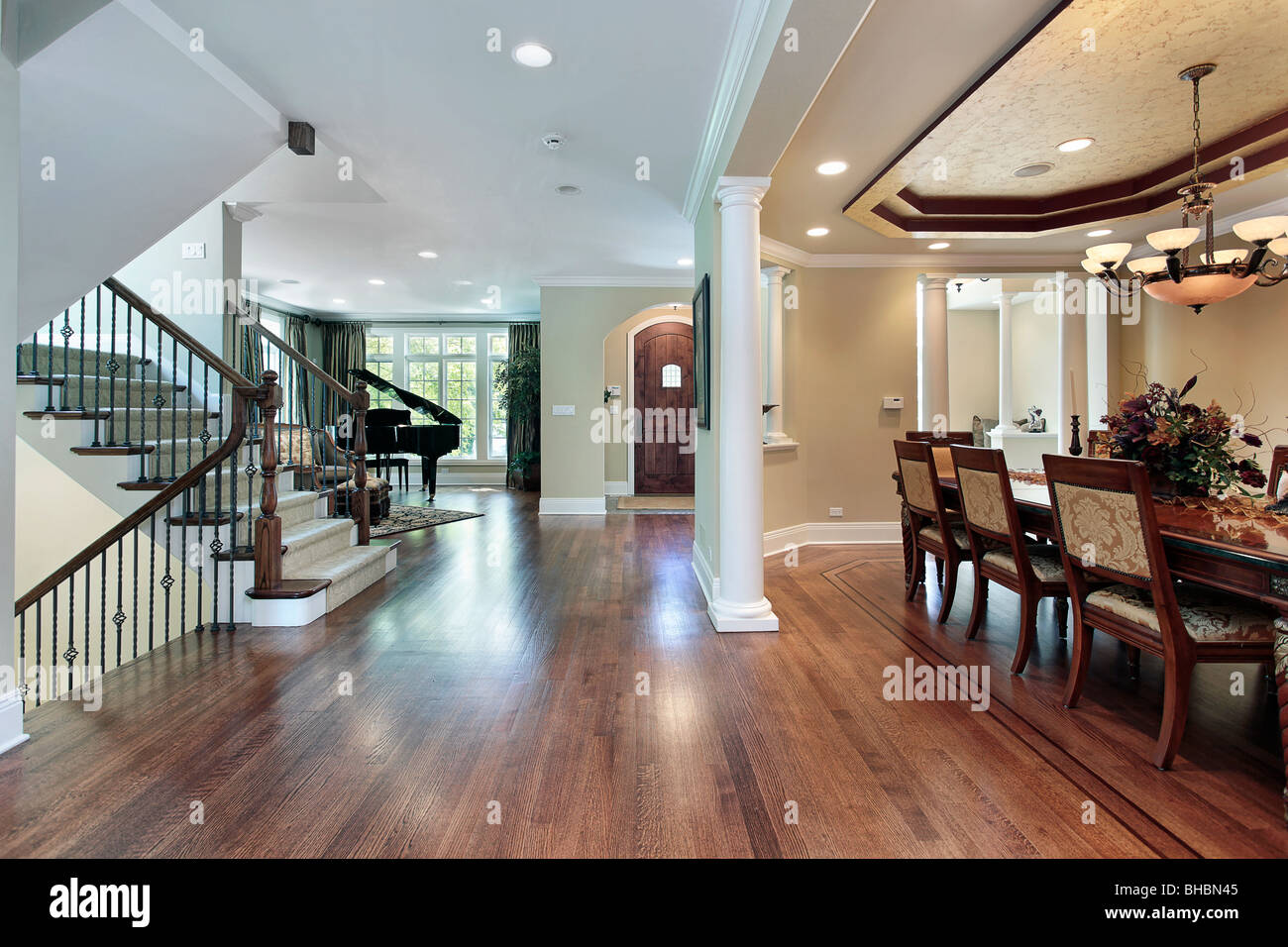 Foyer In Luxury Home With Dining Room View Stock Photo 27917573