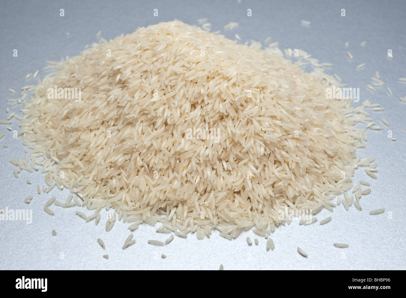 Heap of white uncooked Basmati rice Stock Photo