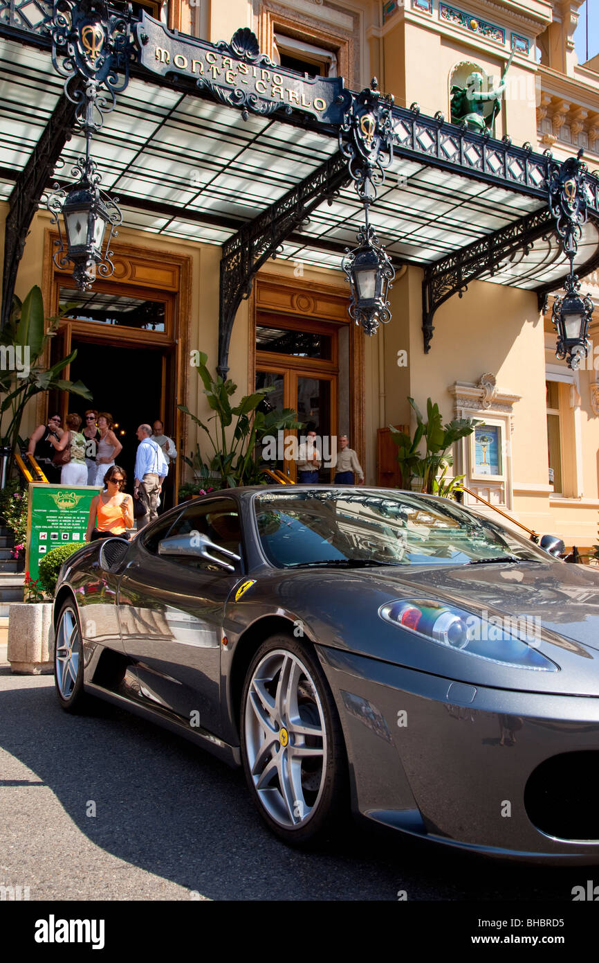 Ferrari parked in front of the Monte Carlo Casino in Monaco Stock Photo