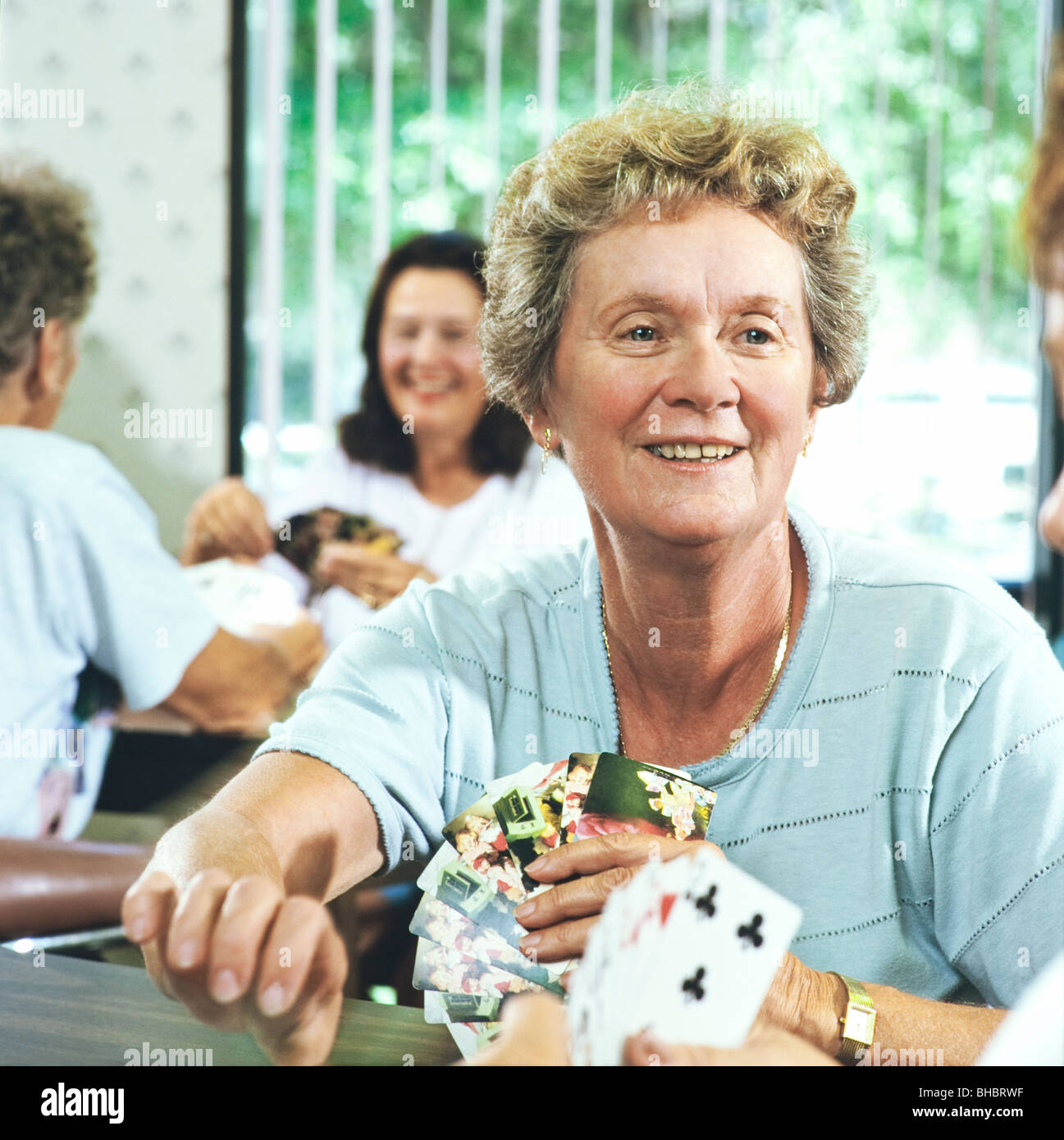 Senior aged women playing cards Stock Photo Alamy