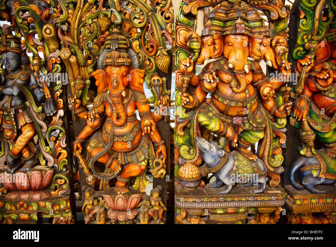 Colourful Indian wood carving of Ganesh in an Indian tourist shop, India Stock Photo
