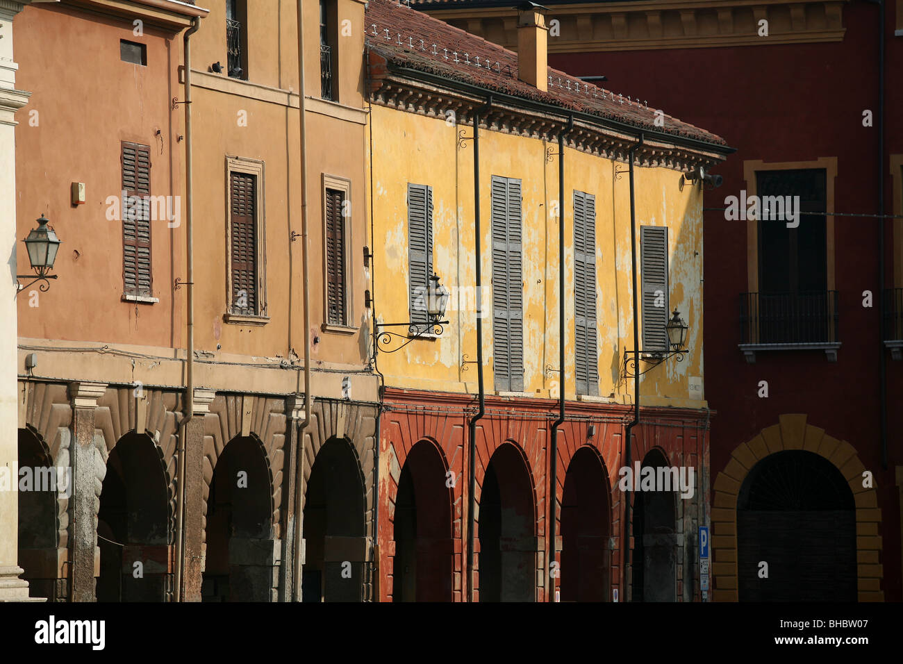 Italy, Emilia Romagna, Guastalla, downtown, colorful houses, porches, Stock Photo