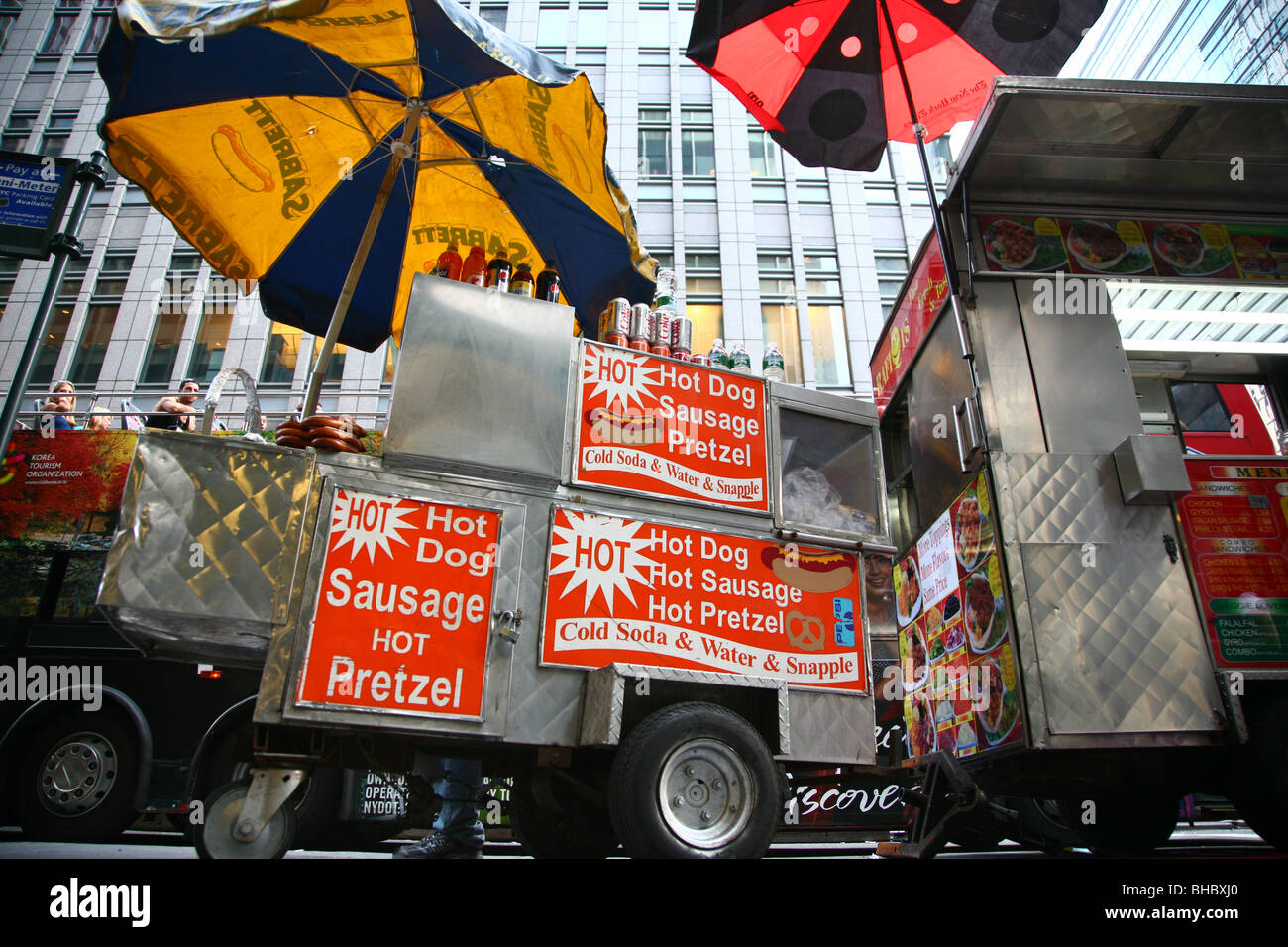 Hot dog and pretzel carts in midtown Manhattan, New York, NY, USA Stock Photo