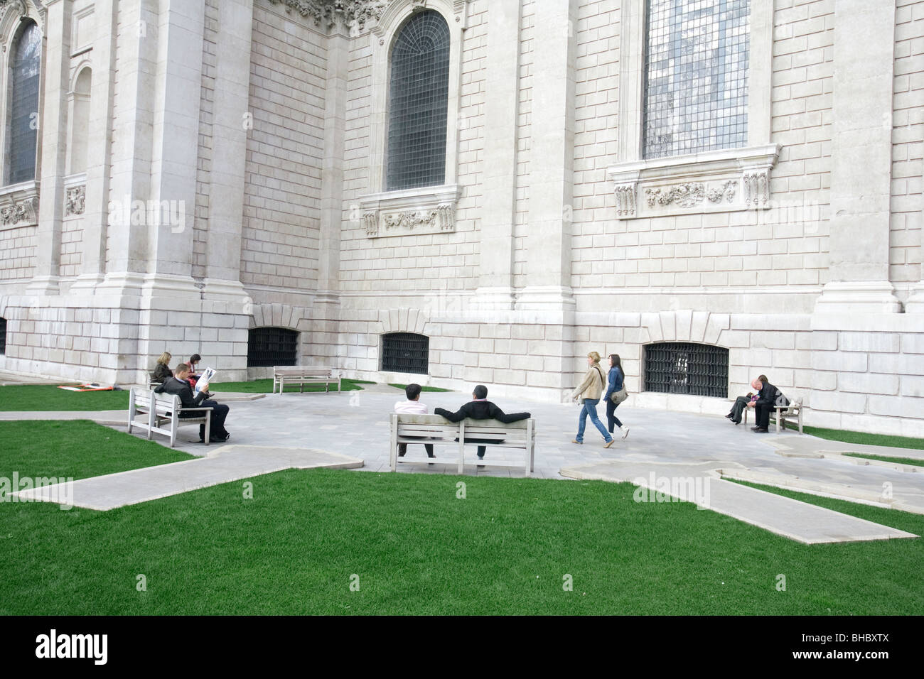 people relaxing in the new garden at st pauls cathedral in london Stock Photo
