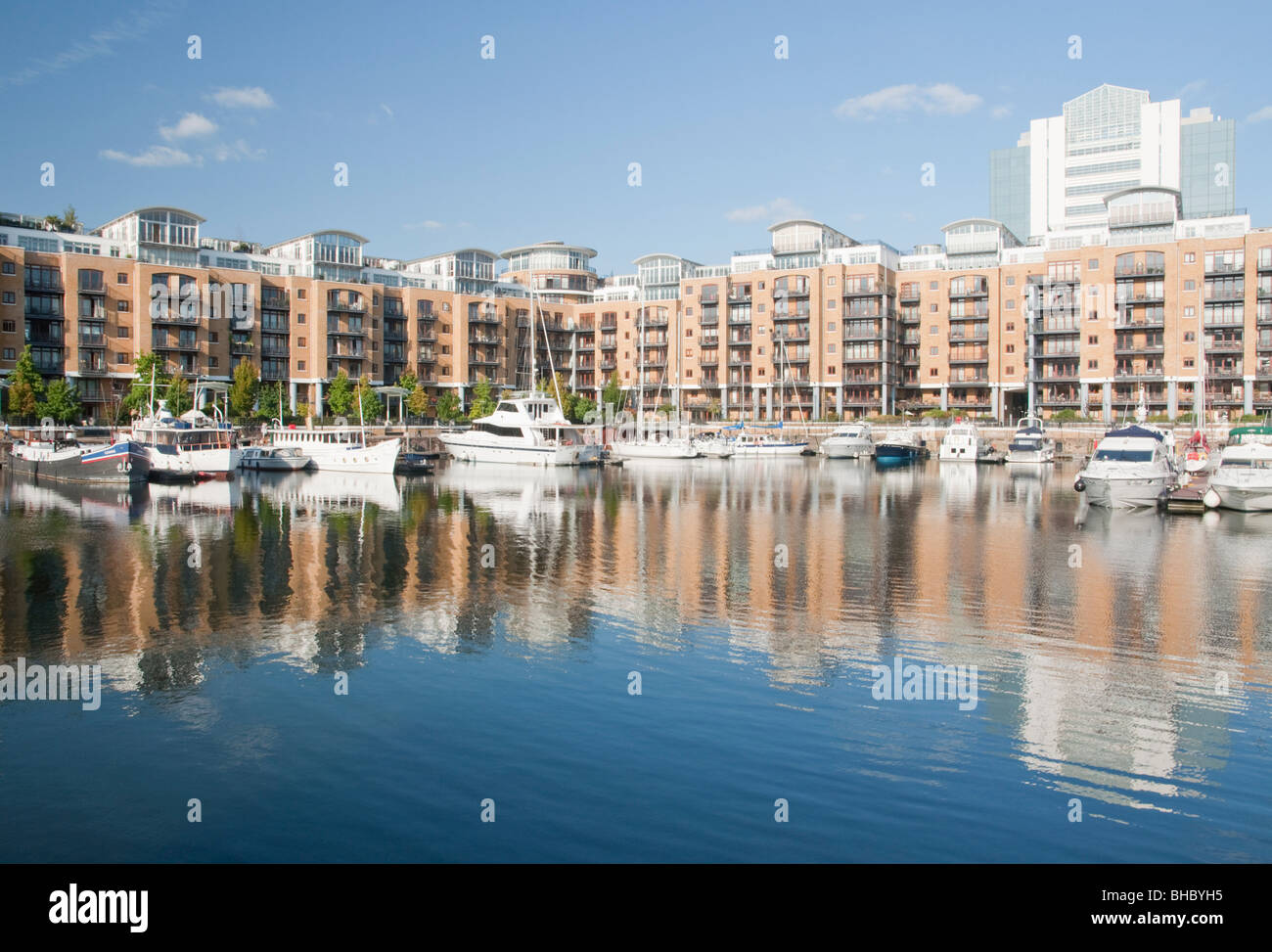 Waterside properties boats and moorings at St Katherine Docks, London Stock Photo