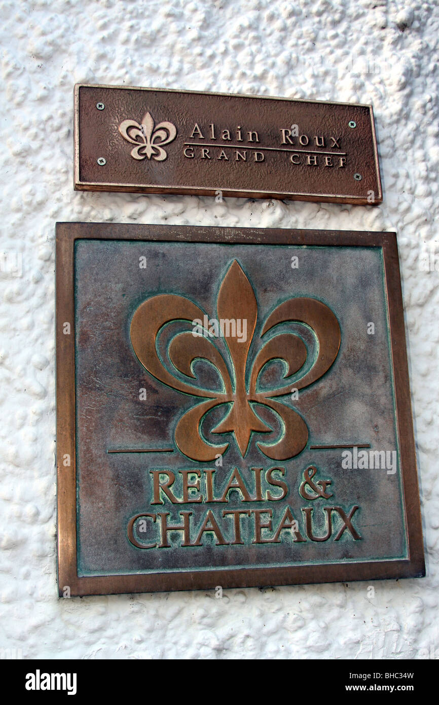 Relais & Chateaux sign + Alain Roux Grand Chef sign at the Roux family's Waterside Inn, in Bray, Berkshire, England, UK Stock Photo