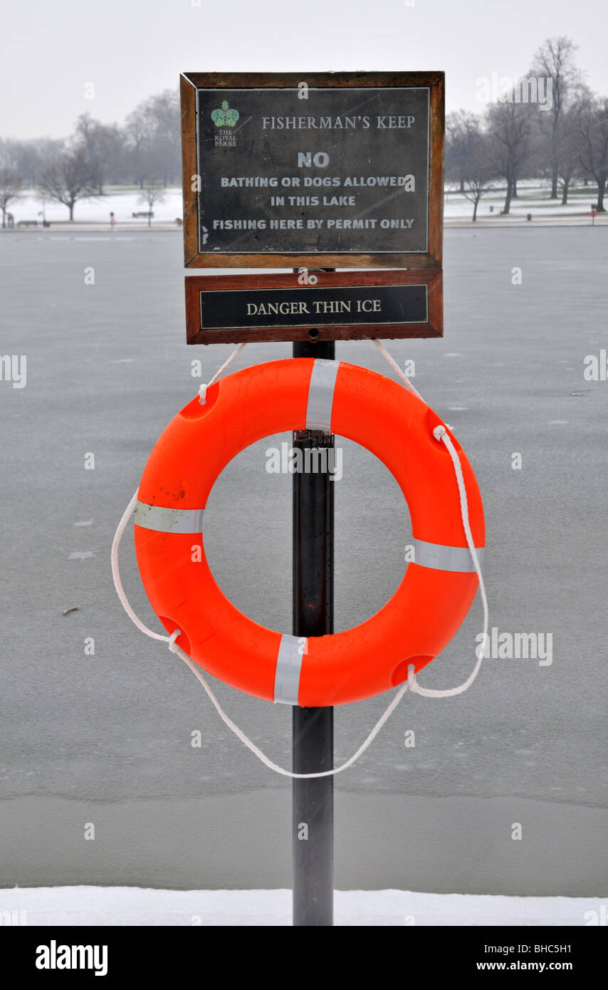 Lifebelt and warning sign, Serpentine, Hyde Park, London W2, United