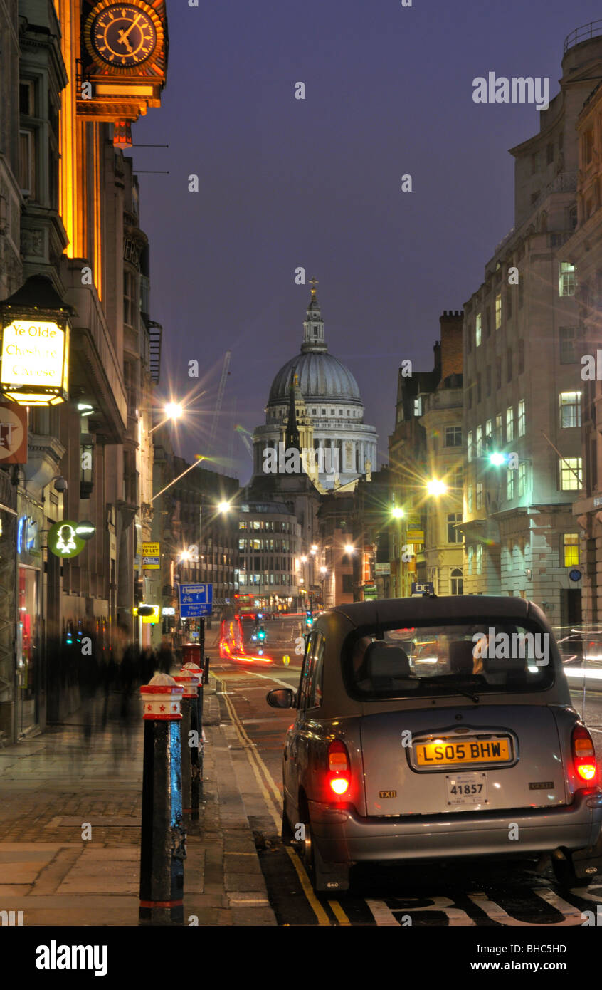Night time taxi in Fleet Street with St Paul's Cathedral and Ludgate Hill, London EC4A, United Kingdom Stock Photo