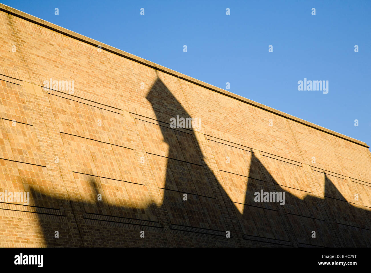 Early Evening Shadows From Nearby Buildings Fall On A Wall Stock Photo Alamy
