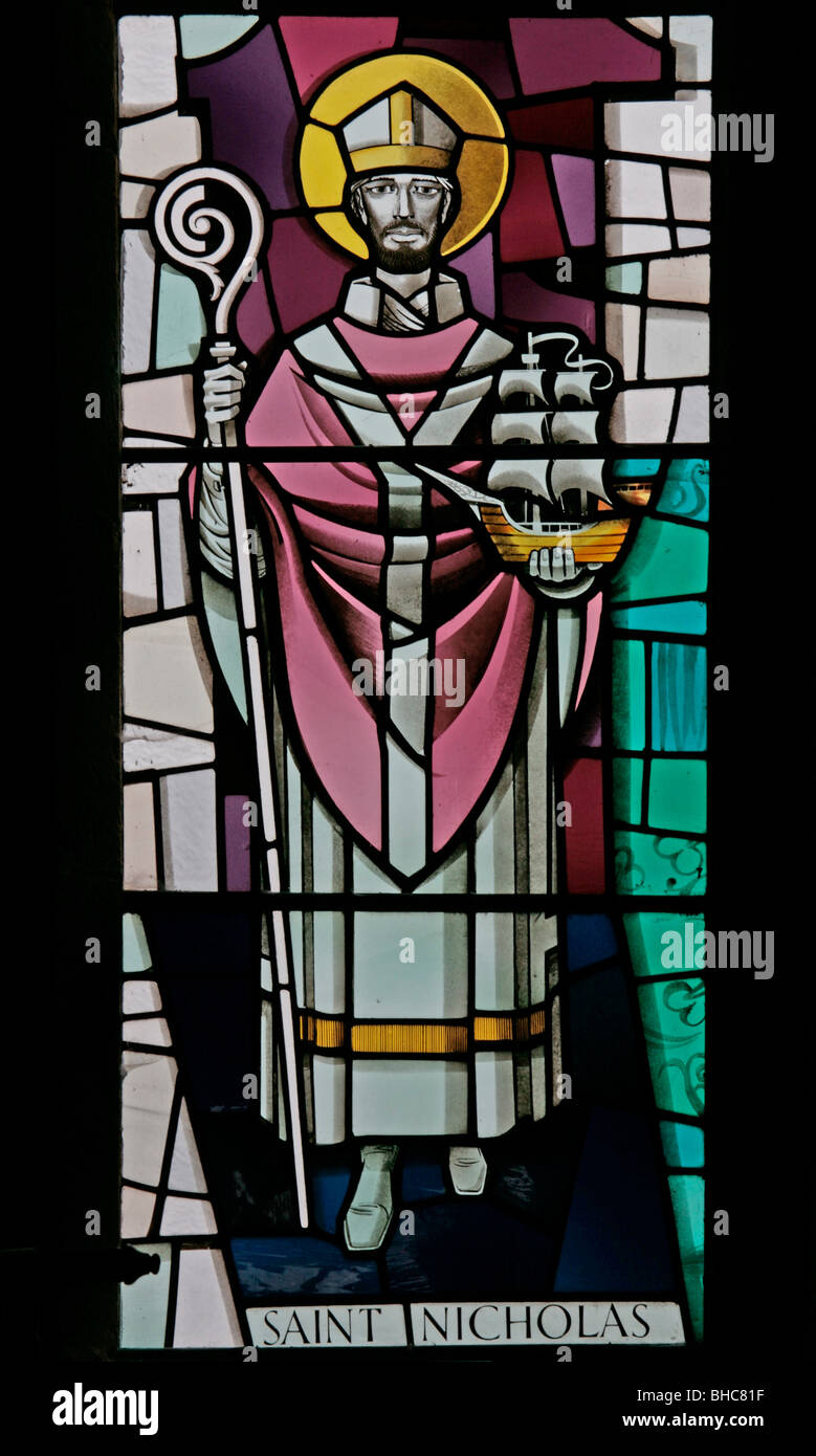 A modern stained glass window depicting Saint Nicholas of Myra, by Harry Harvey, St Mary's Church, Leake, North Yorkshire Stock Photo