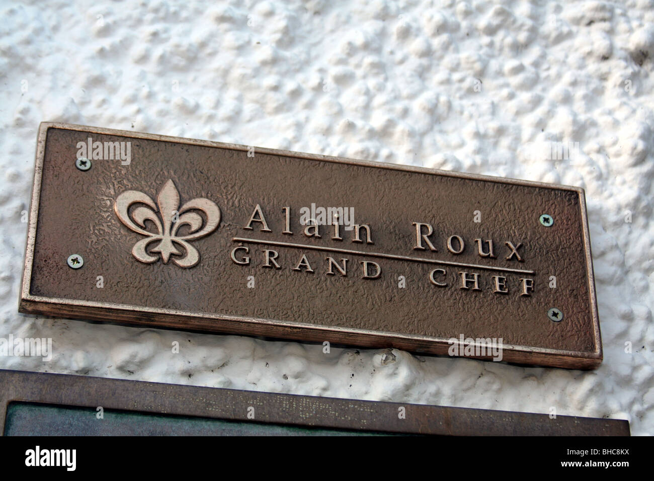 Alain Roux Grand Chef sign on the wall of the Roux family's Waterside Inn, in Bray, Berkshire, England, UK Stock Photo