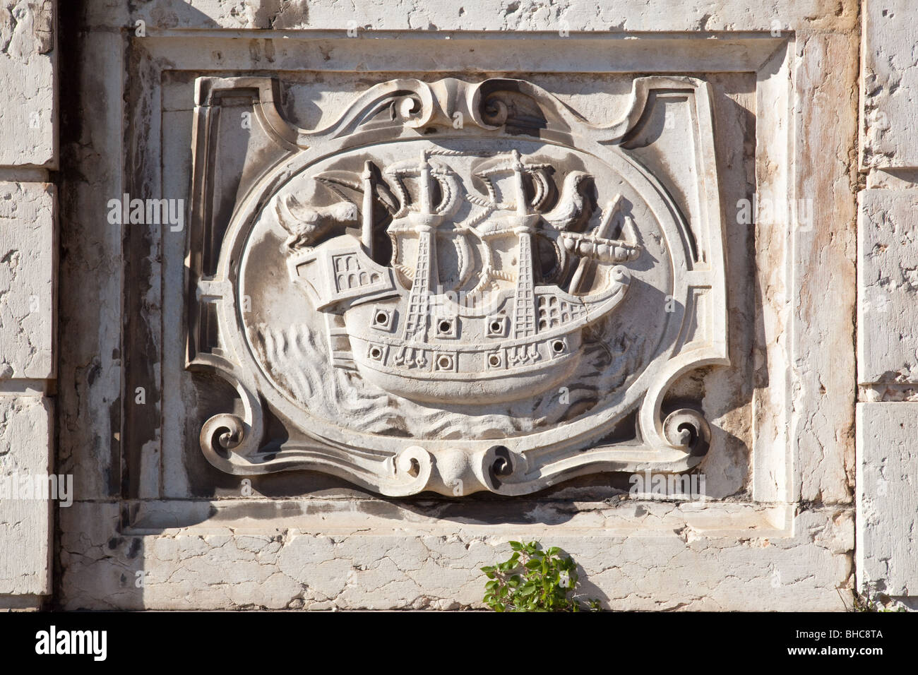 Lisbon Municipality Coat of Arms in the Chafariz D’El Rei (King’s Fountain) in the lower part of Alfama. Lisbon, Portugal Stock Photo