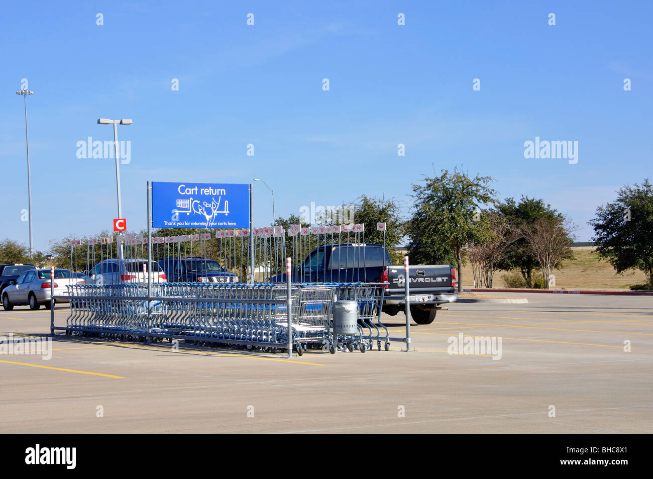 Shopping cart return in parking lot of large store, USA Stock Photo Alamy