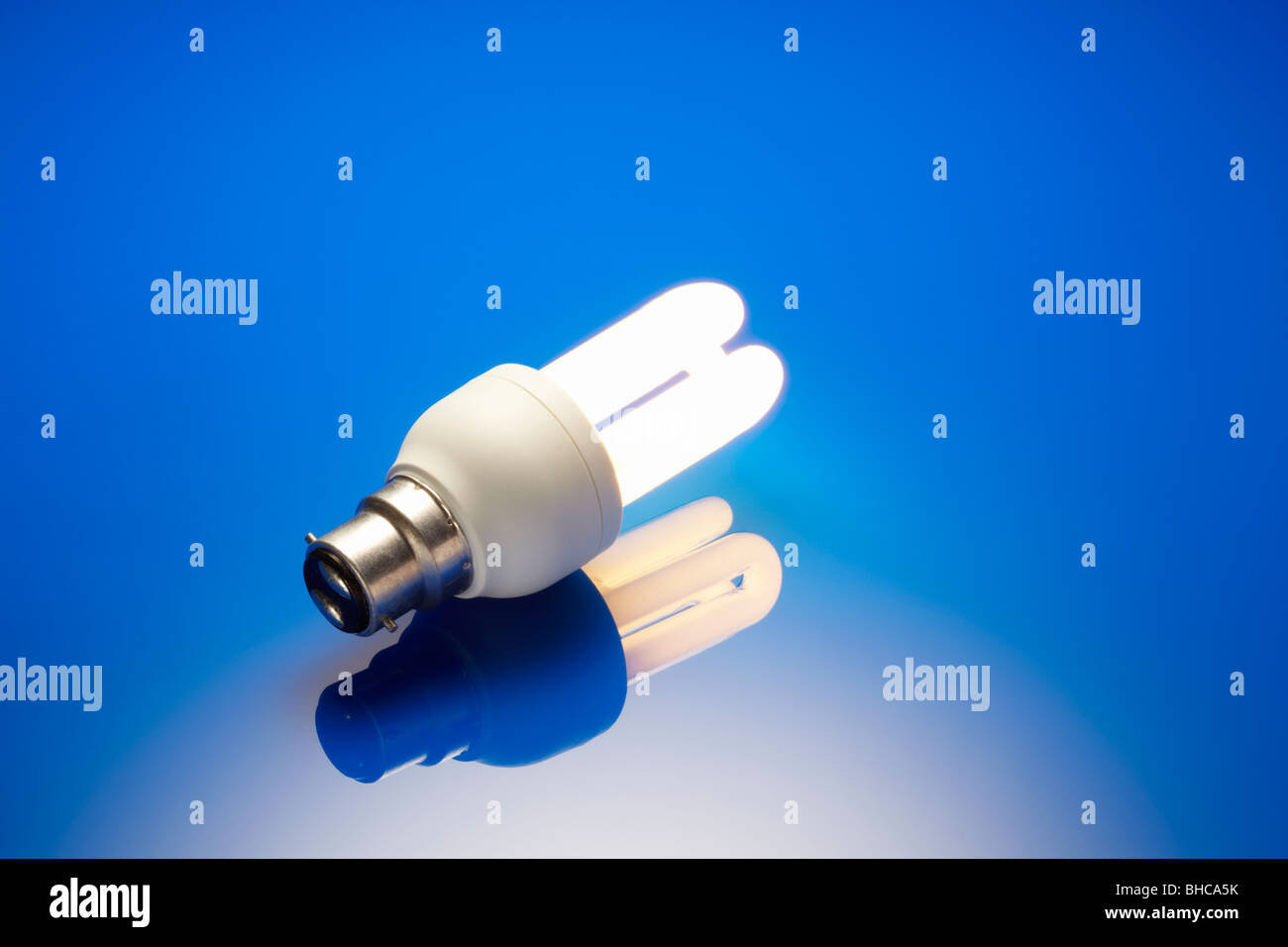 Energy Saving Bulb Illuminated Stock Photo