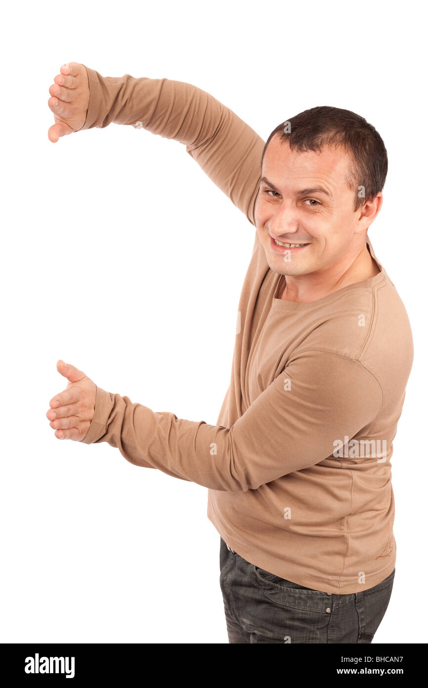 Man pushing with hands to the side of the image Stock Photo - Alamy