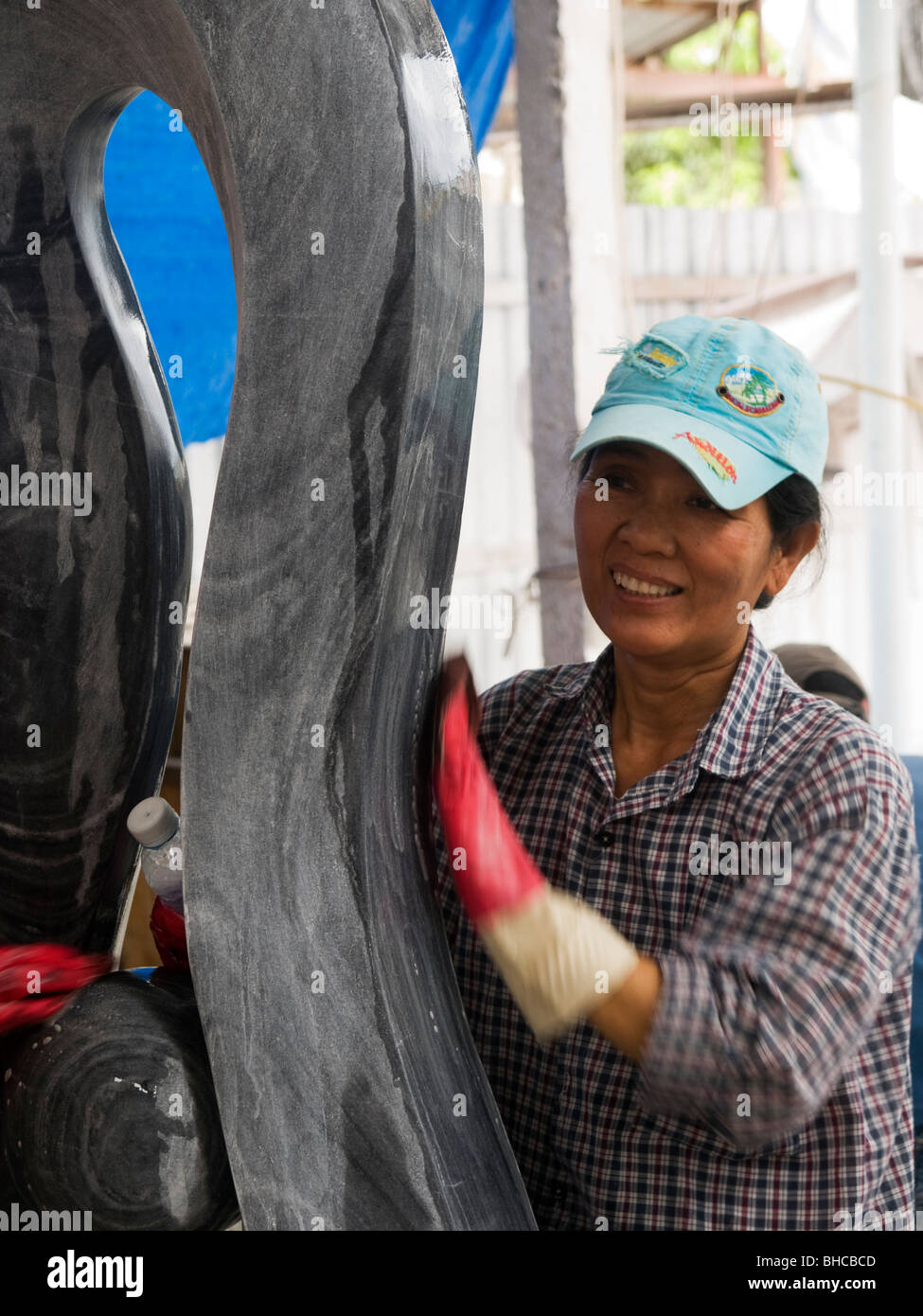 Cleaning a marble statue Stock Photo Alamy