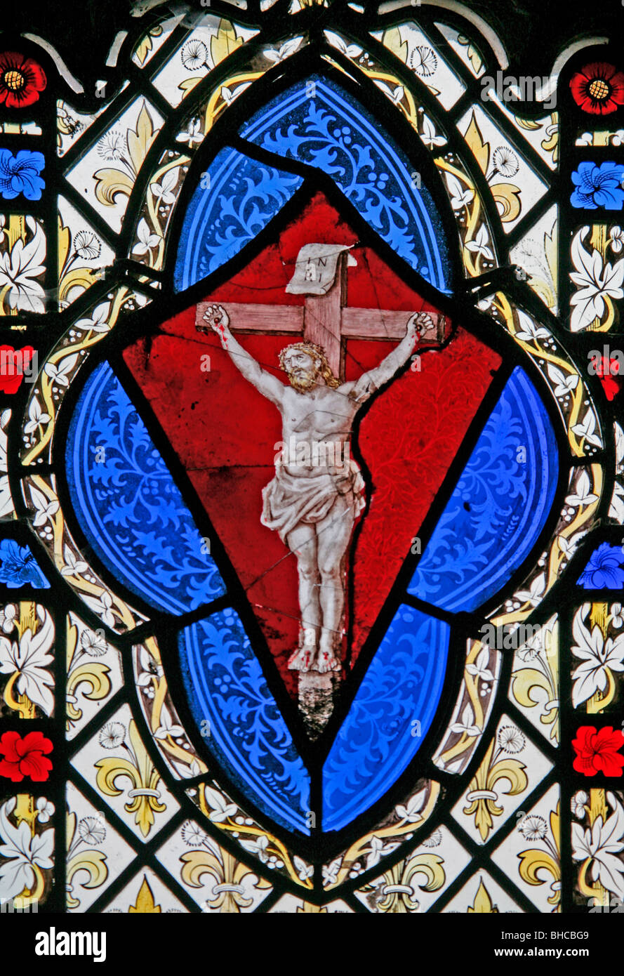 Detail from a stained glass window depicting The Crucifixion, All Saint's Church, Great Thirkleby Stock Photo