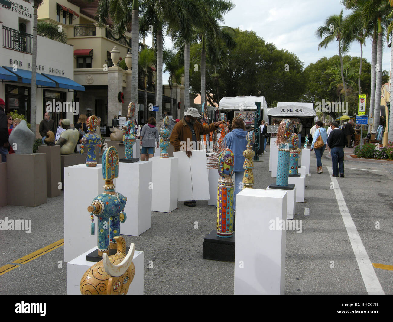 A display of decorative sculptures at an open air art show on 5th Ave south Naples Florida USA 2009 Stock Photo