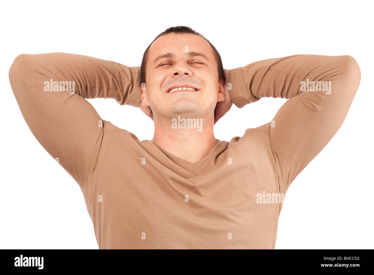 Man resting with his arms crossed behind his neck Stock Photo - Alamy