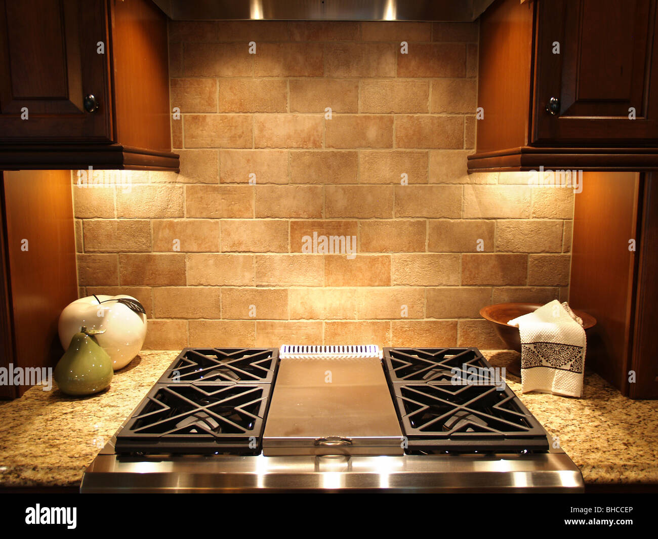A modern cooktop in a kitchen in an upscale luxurious american home