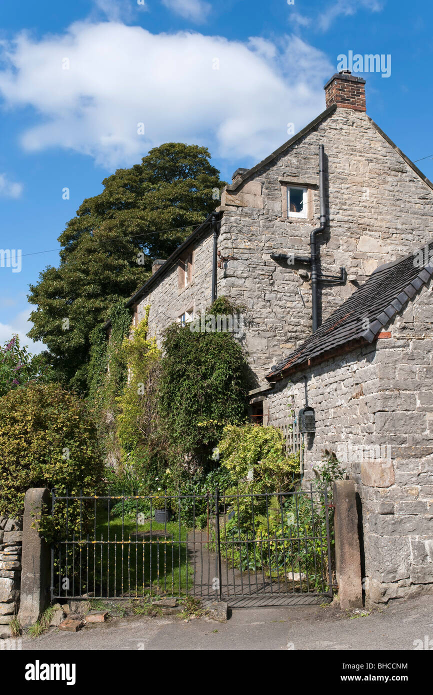 village with houses in countryside tissington, derbyshire, peak