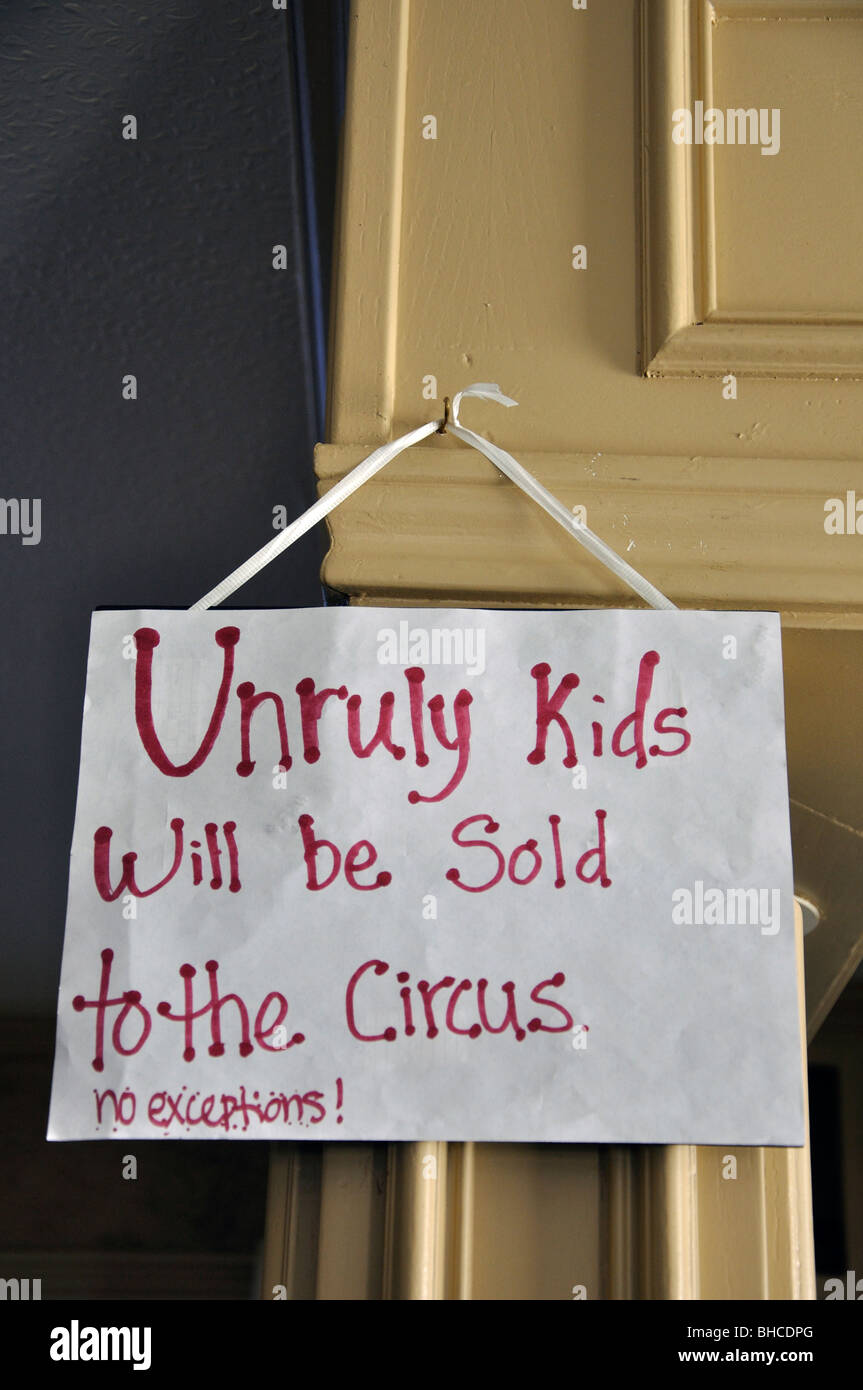 Note in museum saying "Unruly kids will be sold to the circus. No exceptions." Stock Photo