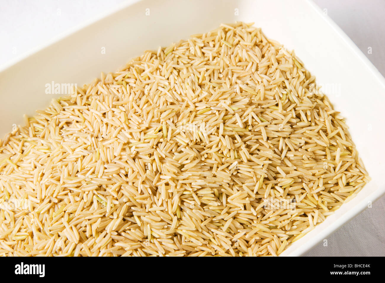 Fair Trade Organic Brown Basmati Rice in a Dish Stock Photo
