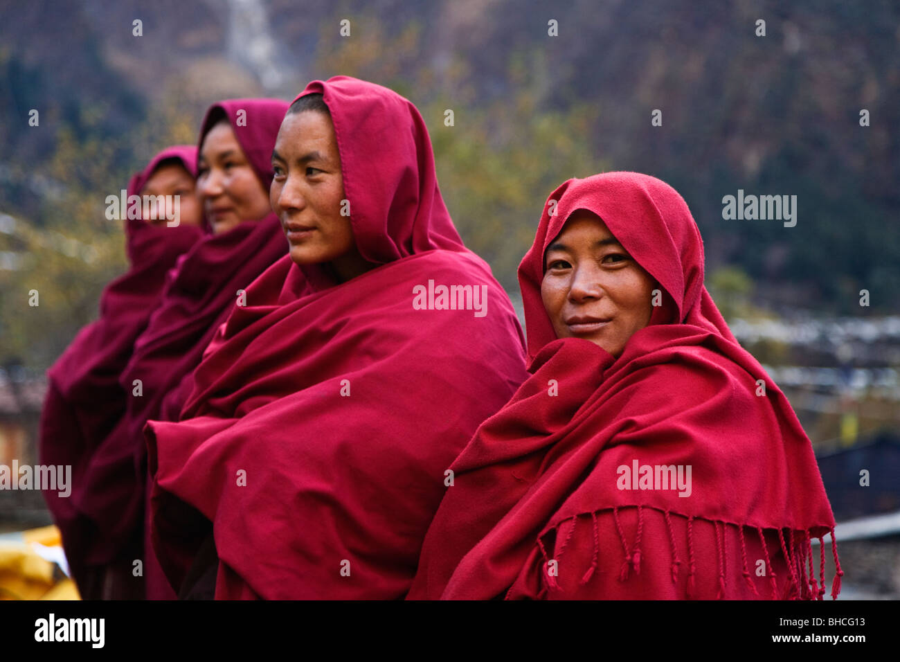 Ningmapa nuns wear traditional robes at a remote TIBETAN BUDDHIST