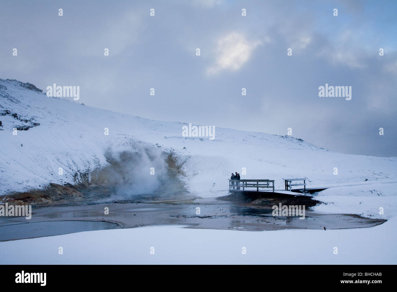 Tourists in a geothermal area in Krisuvik, Iceland. Stock Photo