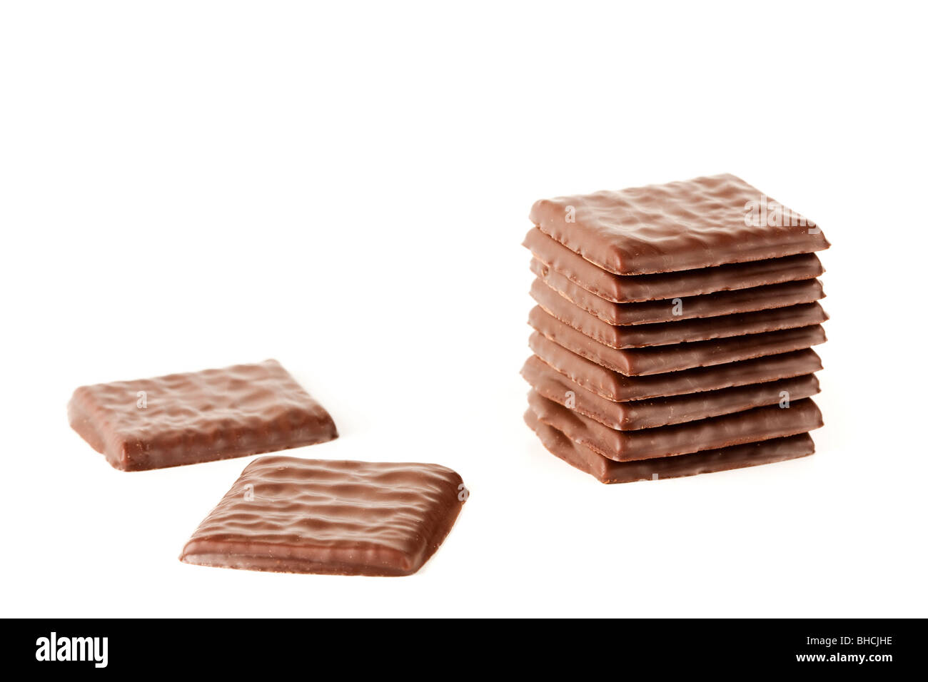 Close up of a stack of chocolate isolated on white background Stock ...