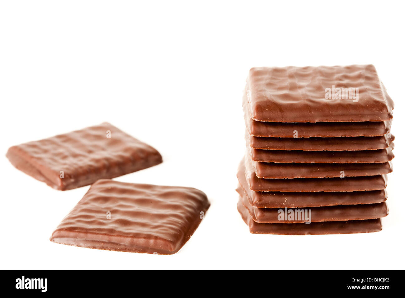 Close up of a stack of chocolate isolated on white background Stock ...