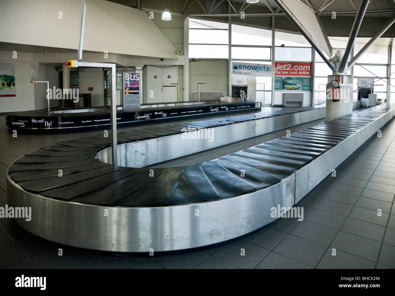 Luggage reclaim carousel belt Chambery airport near Aix les Bains on Lac du Bourget in the
