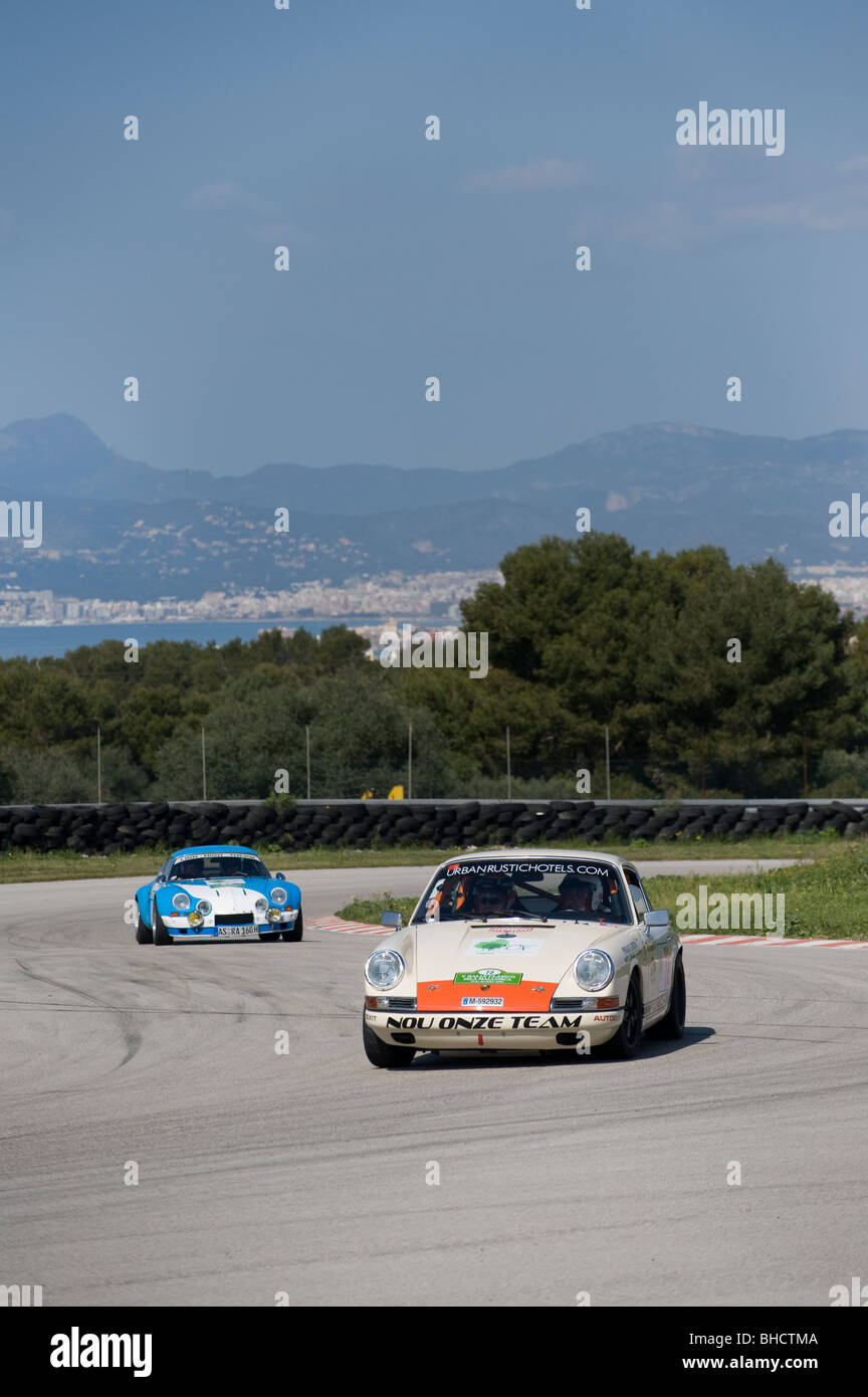 White 1966 Porsche 911S classic sports car racing in a rally in Spain. Stock Photo
