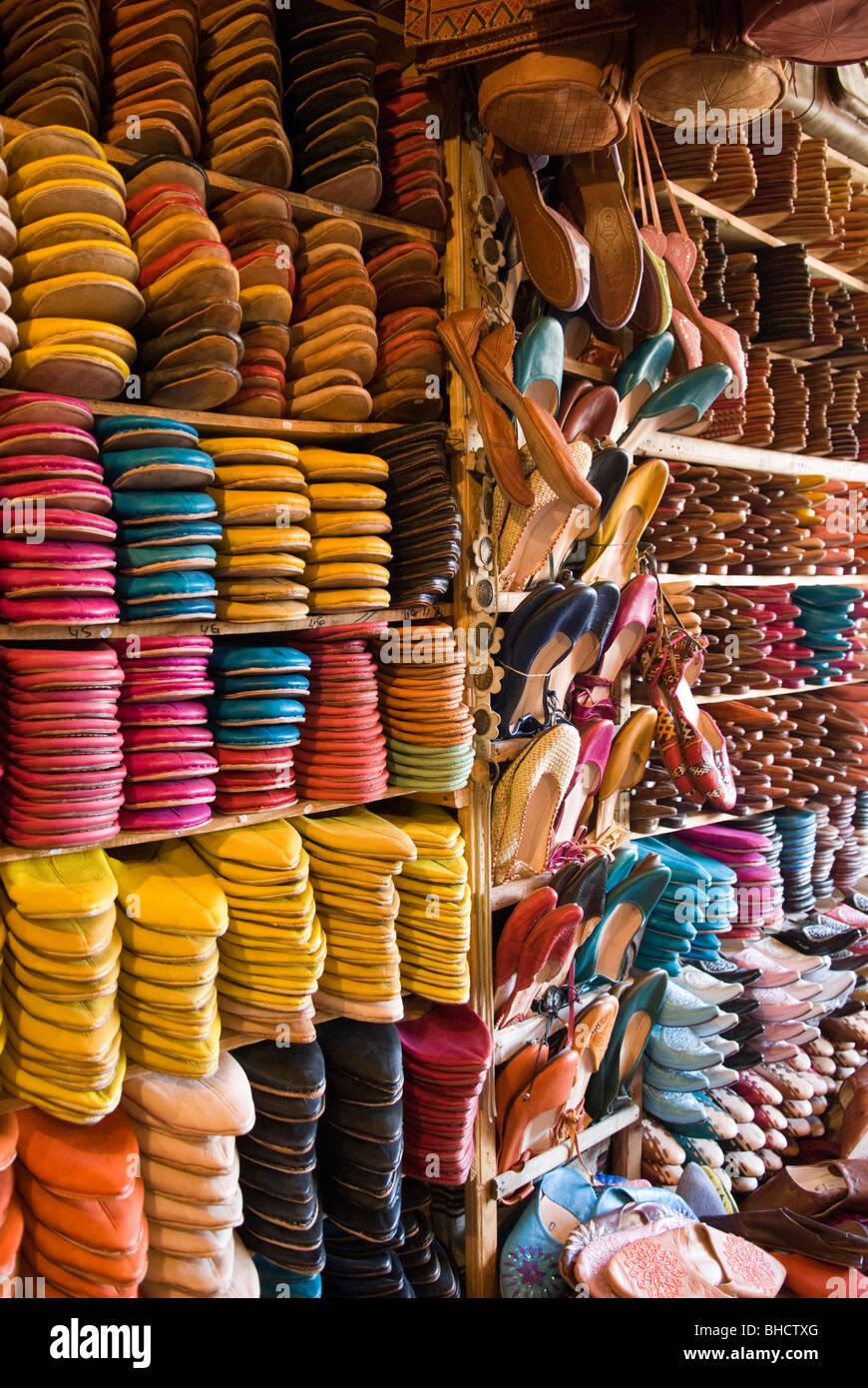 Leather slippers in a Fes shop, Fes, Morocco. Stock Photo