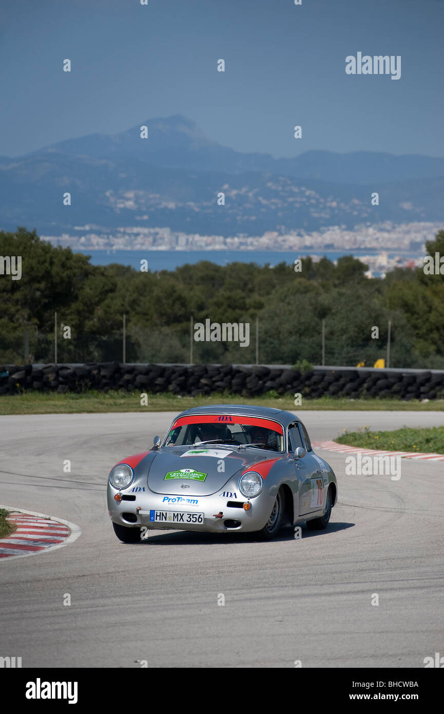 Silver 1962 Porsche 356 Porsche classic sports car racing in a rally in ...