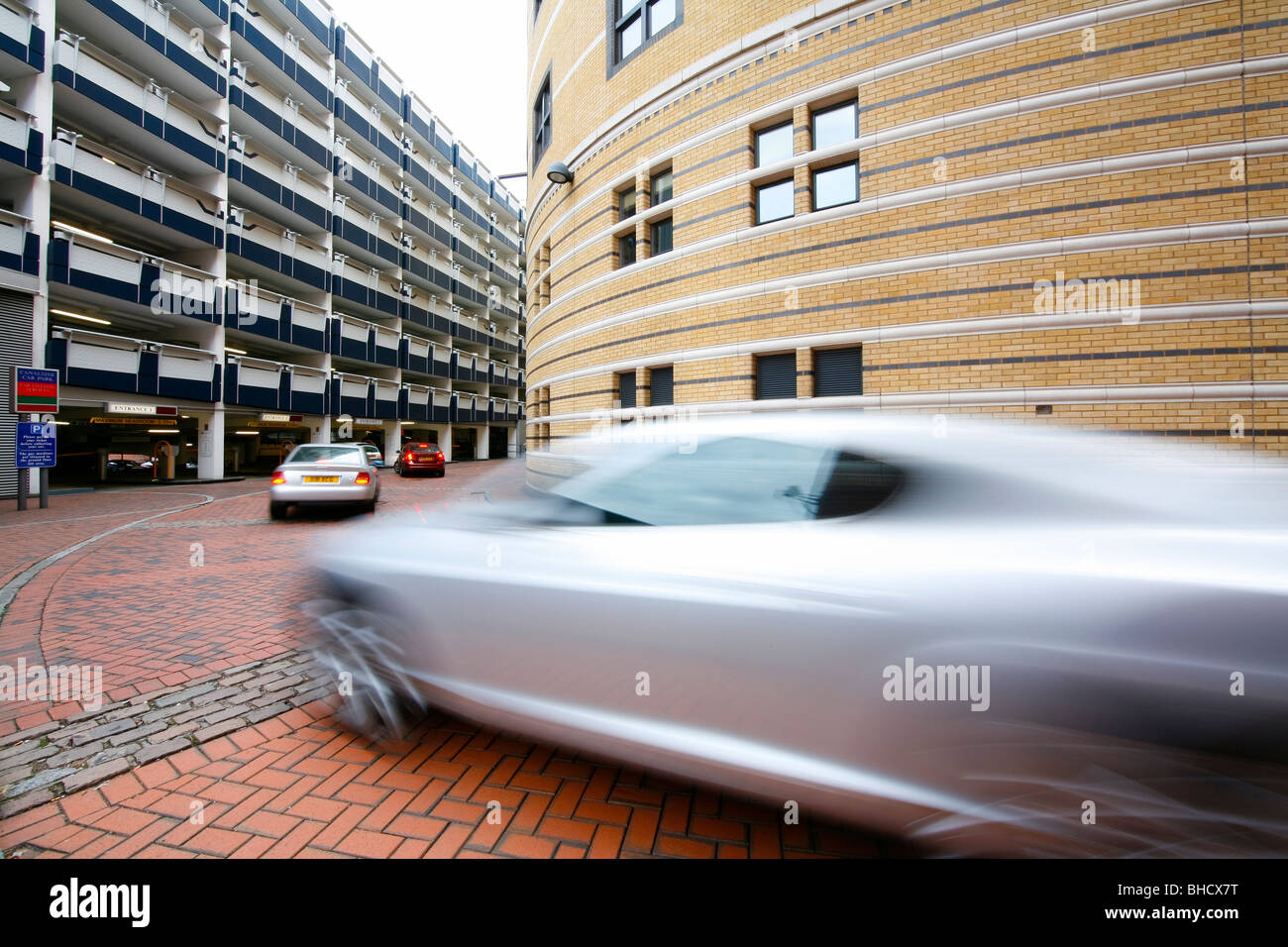 Cars in a queue waiting to park on the multi storey car park in ...