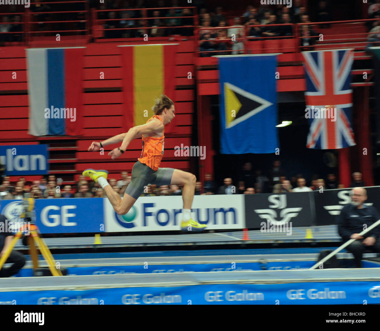 Christian Olsson of Sweden jumps over 17 meters in the triple jump event in the GE Games after several years of injury Stock Photo