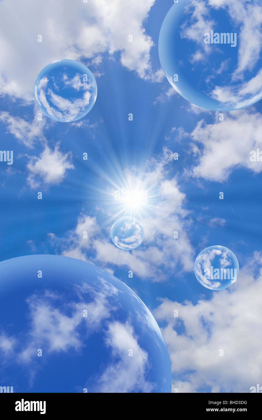 Bubbles floating amongst clouds in blue sky Stock Photo Alamy