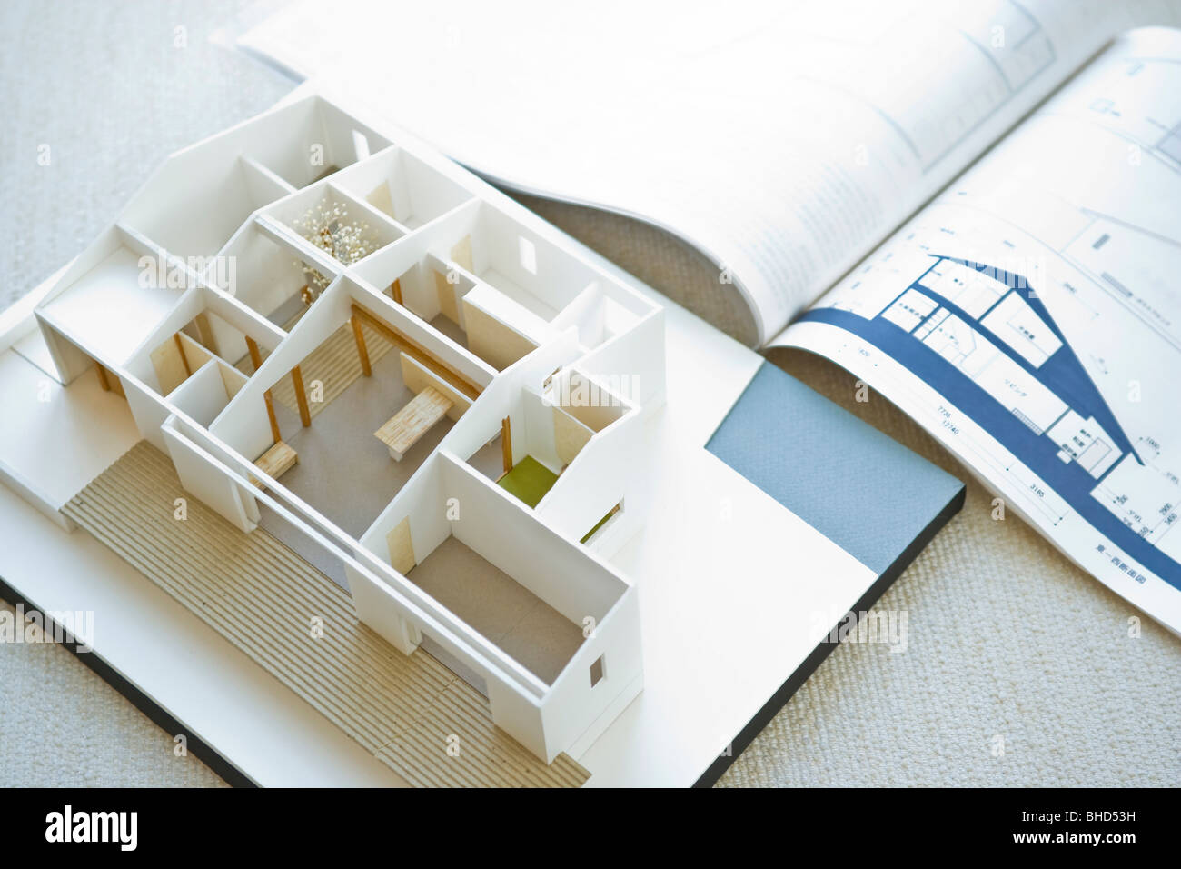 Architectural model with blueprint Stock Photo