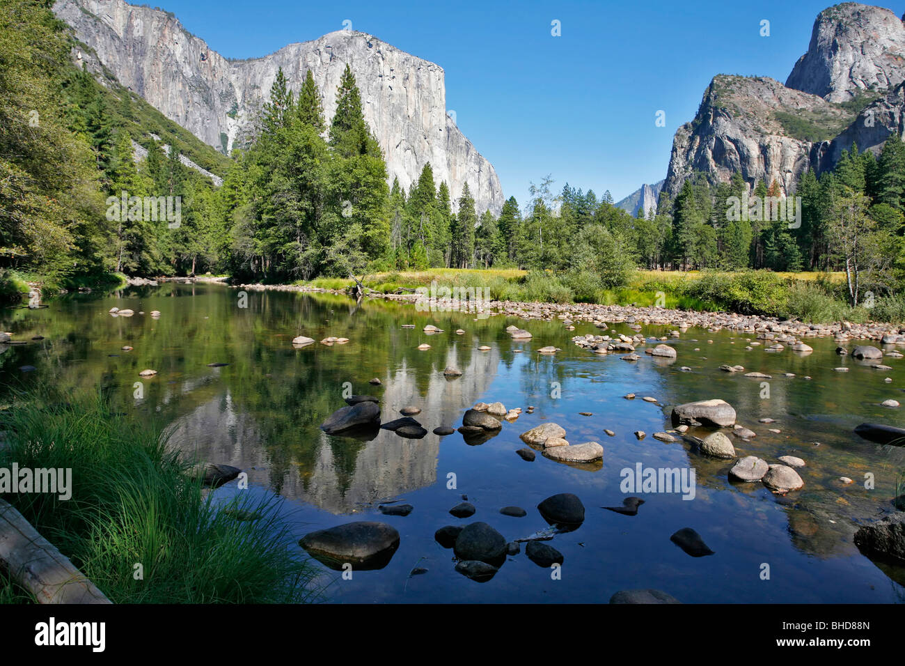 Well-known rocky monolith El-Captain are reflected in the river Mersed in Yosemite park Stock Photo