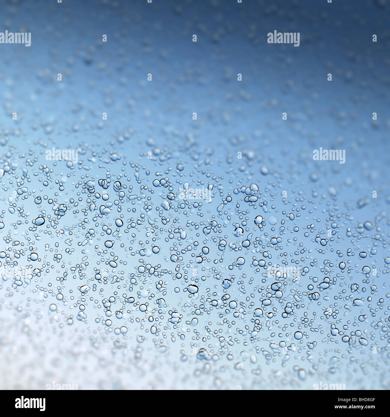 Hi-res 3D render of water drops on glass with a shallow depth of field in clear blue colors. Stock Photo