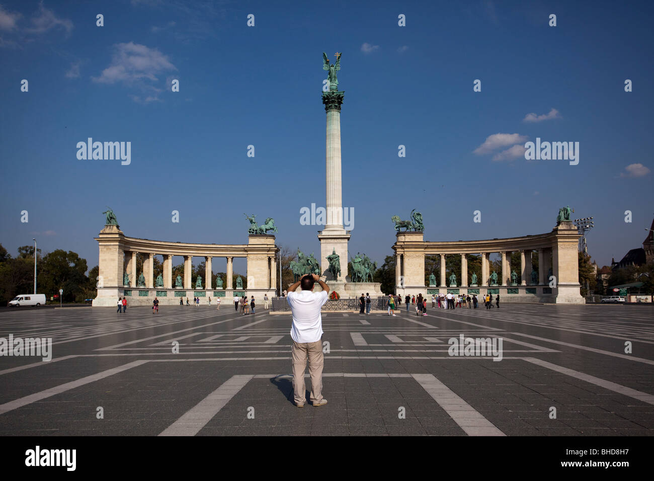 A man taking a photo in Hősök tere Heroe's square Stock Photo